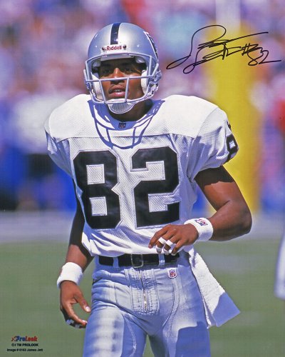 James Jett Signed Raiders White Jersey Running 8x10 Photo