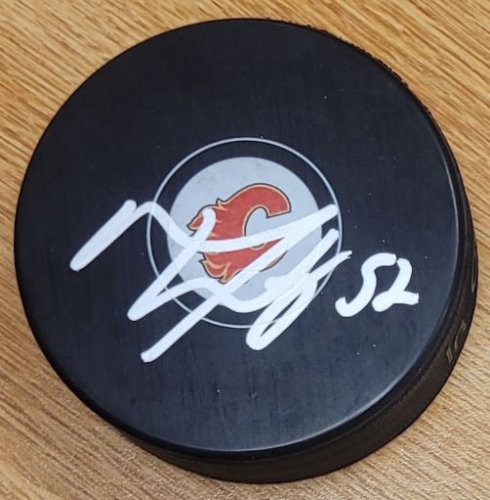 Mackenzie Weegar Autographed Signed Calgary Flames Hockey Puck - Autographs