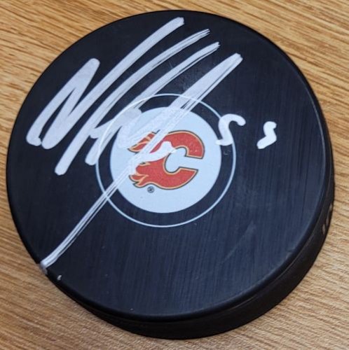 Noah Hanifin Autographed Signed Calgary Flames Hockey Puck - Autographs