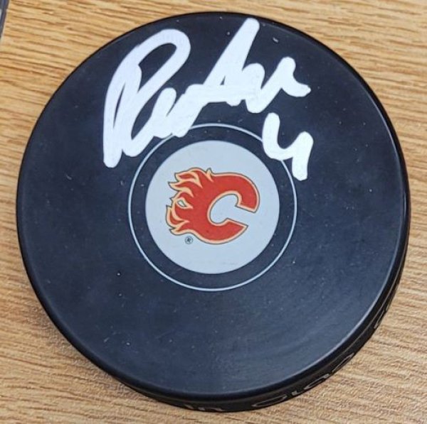 Rasmus Andersson Autographed Signed Calgary Flames Hockey Puck - Autographs