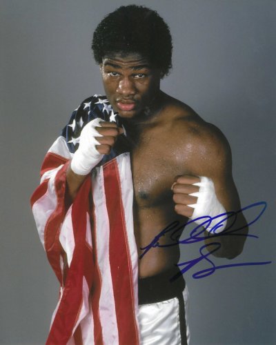 Riddick Bowe 16 x 20 AUTOGRAPHED WITH INSCRIPTIONS PHOTO –